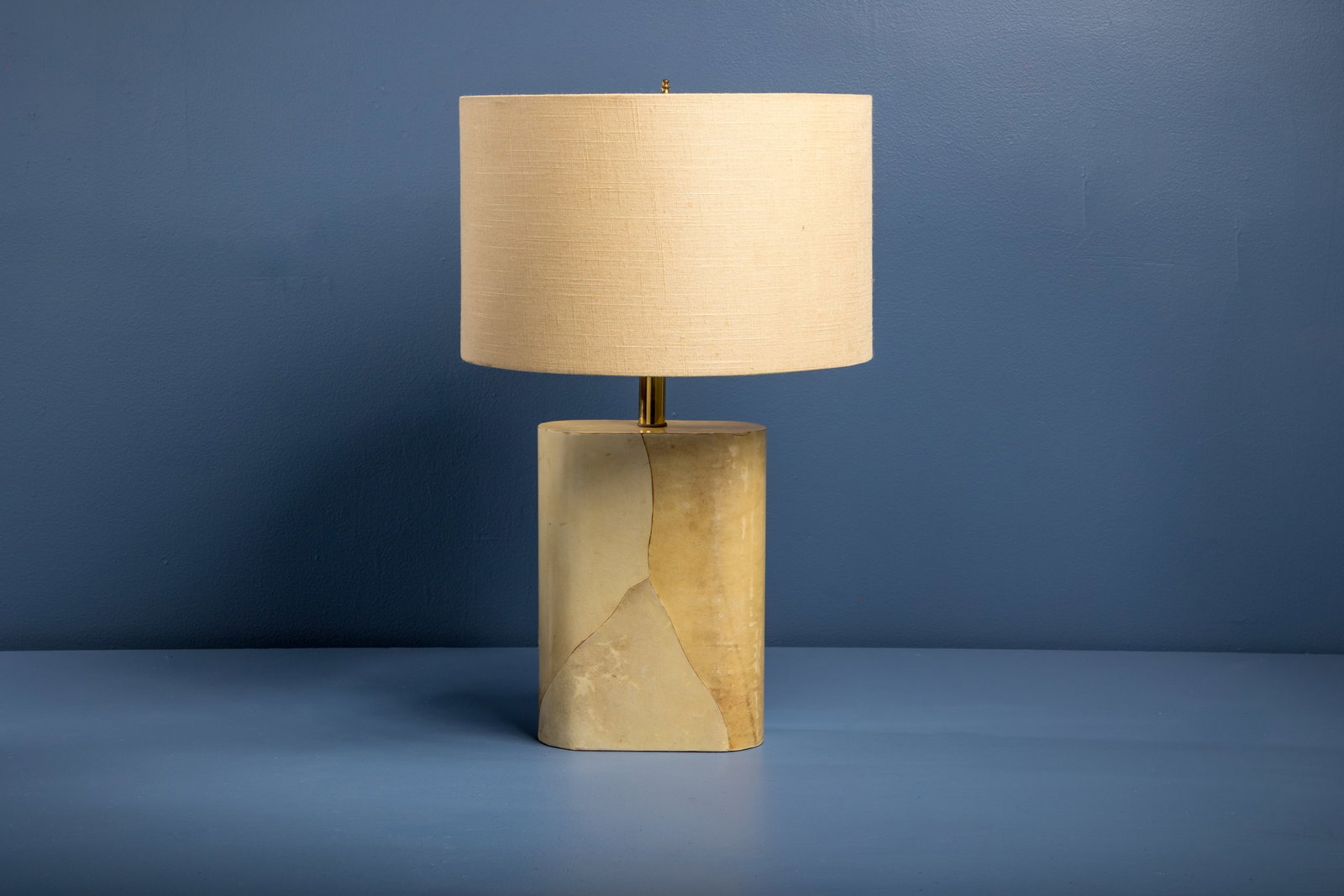 Karl Springer Style, Goatskin Table Lamp: KARL SPRINGER STYLE Table lamp, 1970s Lacquered goatskin, brass. 24" H x 15" Diameter, including shade Body only: 15" H x 8" W x 3.5" D