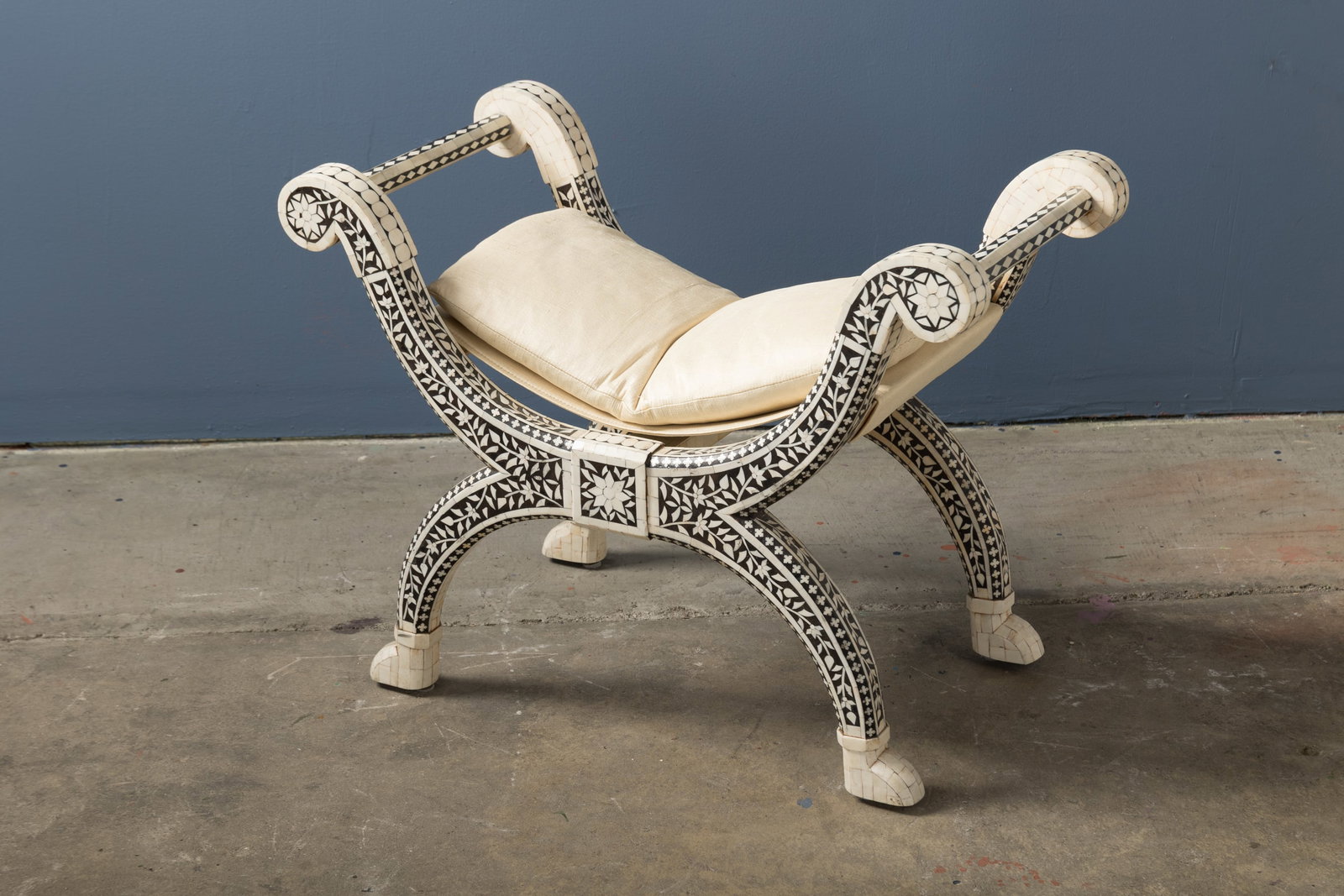 Egyptian, Inlaid Stool: EGYPTIAN Inlaid stool, 1960s Ebony, bone veneer, silk, wood. 21.5" H x 28" W x 15" D Seat height: 16"