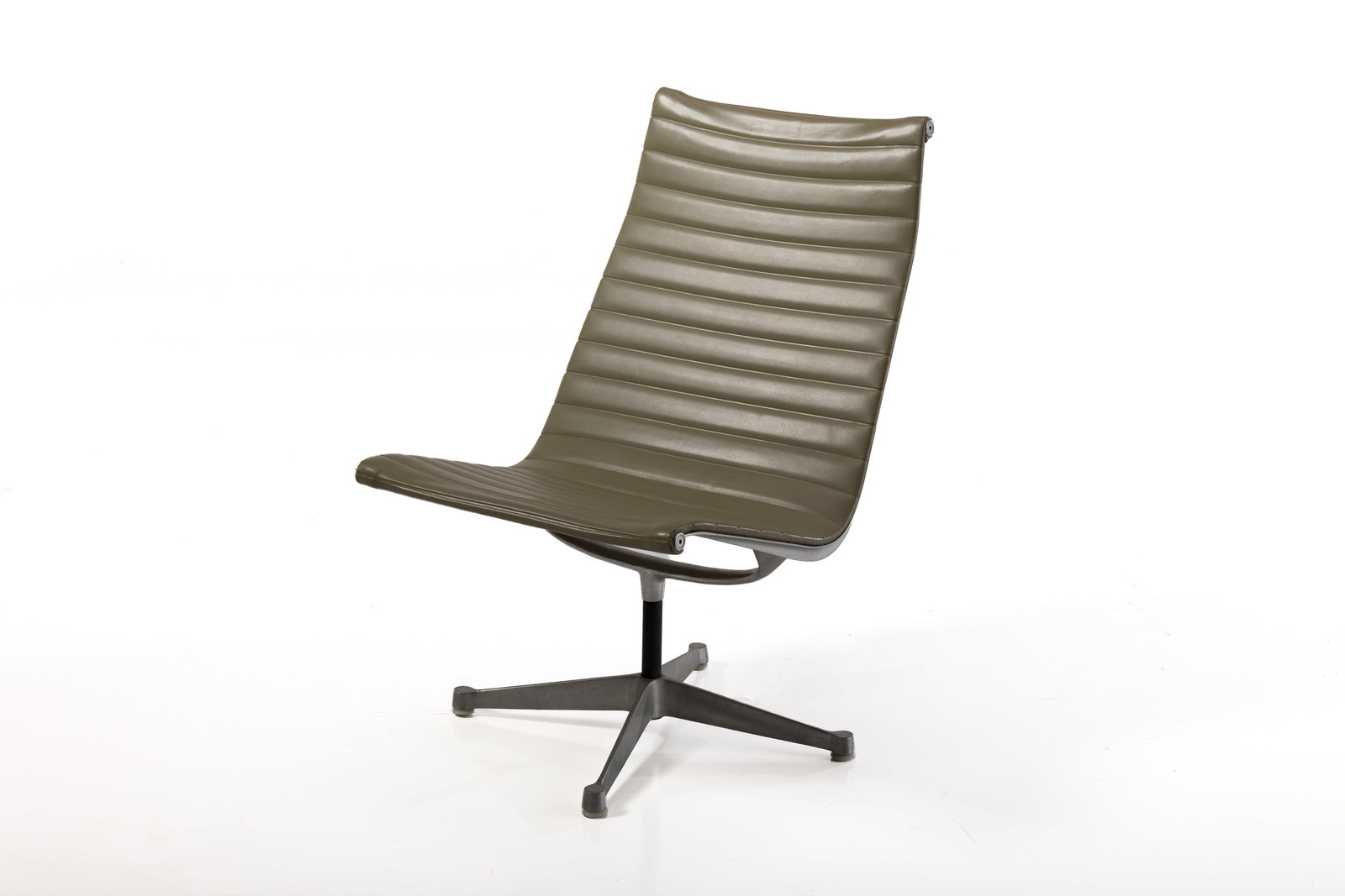 Charles + Ray Eames, 'Aluminum Group' Lounge Chair: CHARLES + RAY EAMES 'Aluminum Group' lounge chair, 1970s Aluminum, vinyl. Manufactured by Herman Miller, USA. Underside with manufacturer's cast mark. 35" H