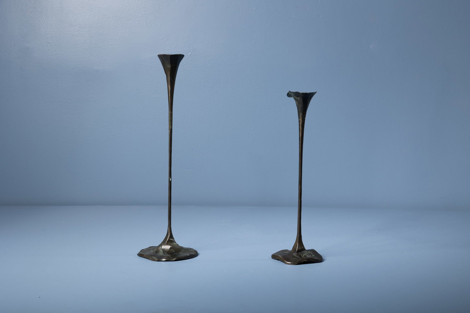 Lothar Klute, Candle Holders (2): LOTHAR KLUTE Two candle holders, 1983 and 1990 Bronze. Each incised with artist's cipher and date. Taller: 19.5" H x 5.25" W x 5.25" D