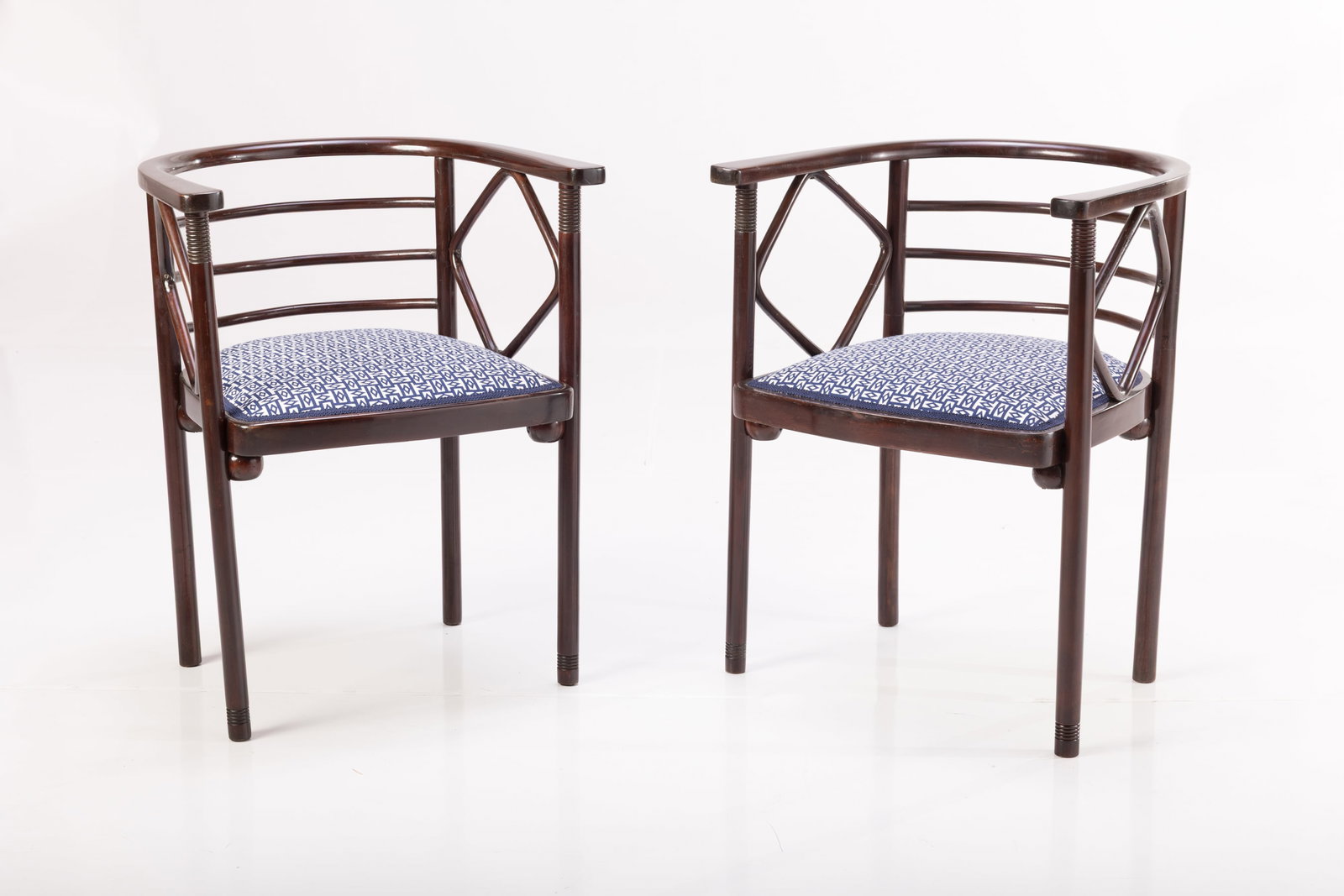 Josef Hoffmann, Chairs (2): JOSEF HOHHMAN Pair of chairs, 1920s Stained wood, fabric. Produced by J&J Kohn, Austria Undersides with manufacturer's stamps and paper labels. Each: 28" H x