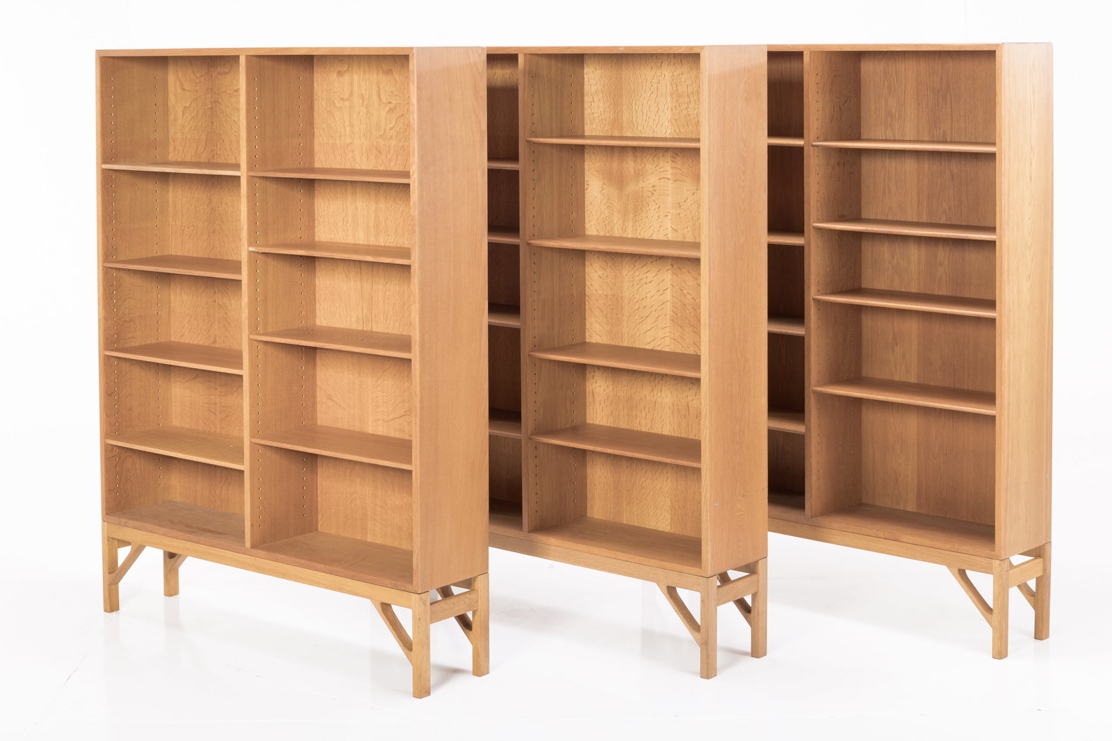 Borge Mogensen, Raised Bookcases (3): BORGE MOGENSEN Set of three raised bookcases, 1960s Oak. Manufactured by C.M. Madsens Fabrikker for FDB Mobler, Denmark. Each with manufacturer's stamps to the back. 