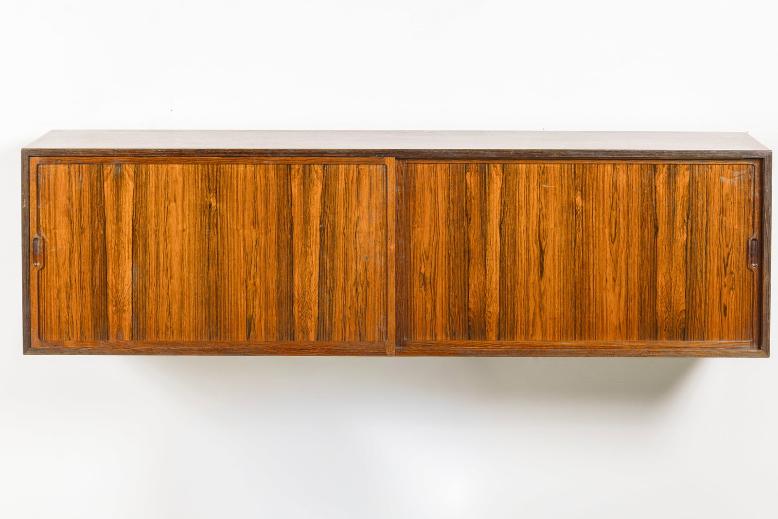Danish, Wall-Mounted Cabinet: DANISH Wall-mounted cabinet, 1960s Rosewood. 17" H x 60" W x 13" D