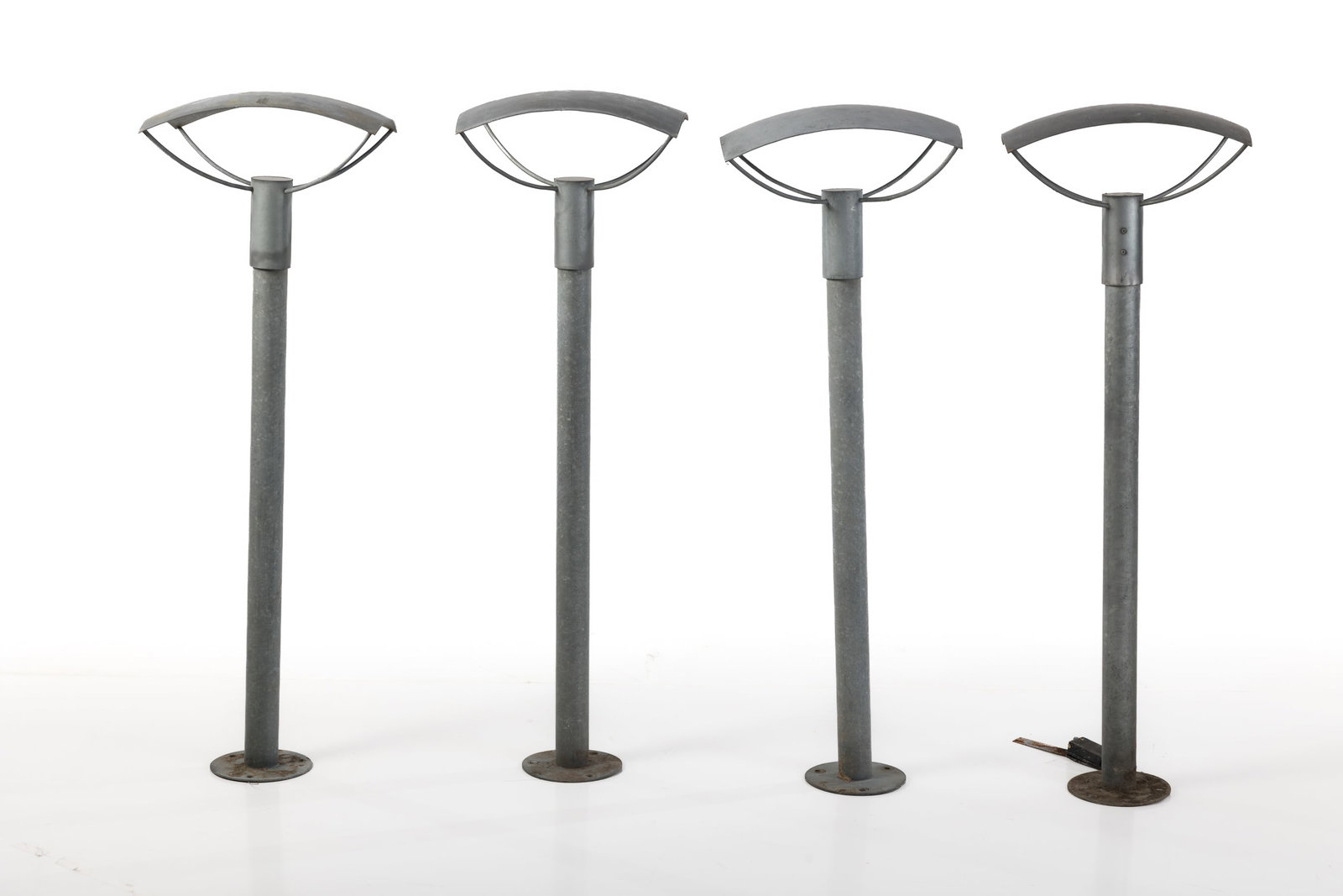 E. S. Horn, Outdoor Standing Lamps (4): E. S. HORN Set of four standing garden lamps, 2005 Galvanized steel, glass. Manufactured by Nordlux, Denmark. Each: 39" H x 13" W x 9" D