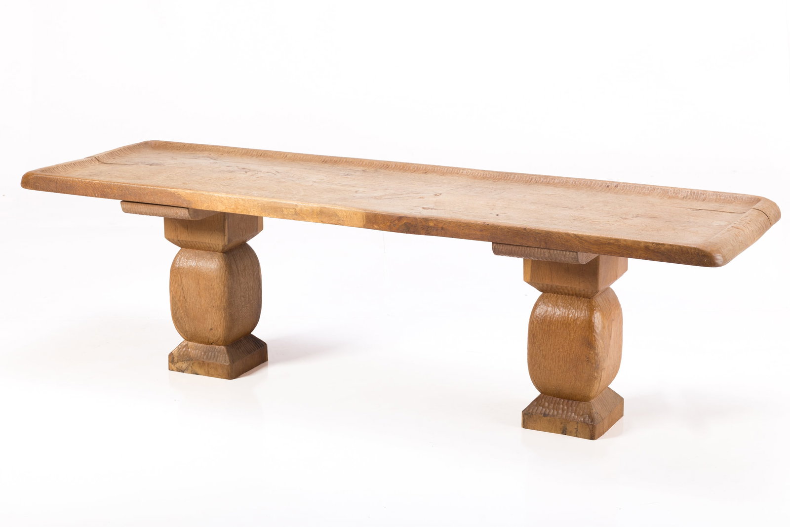 Danish, Console Table: DANISH Low console or coffee table, mid-20th century Chip-carved oak. 21" H x 73.5" W x 23" D 