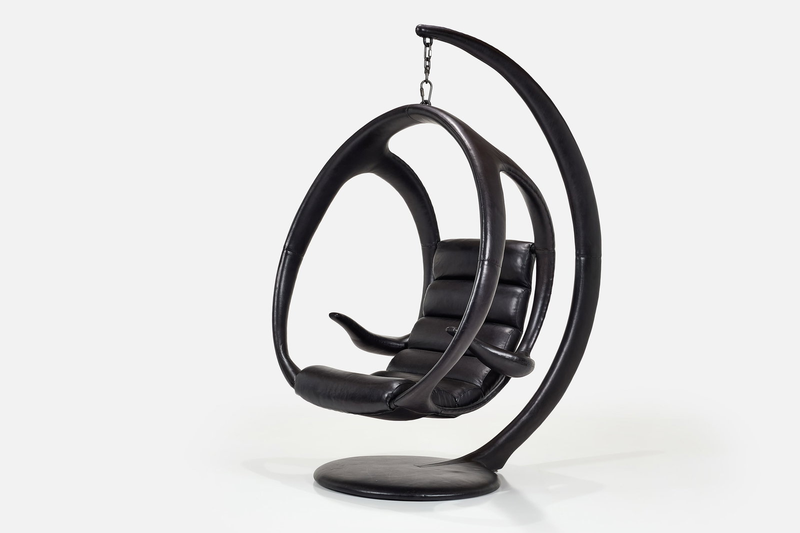 William Emmerson, 'Ab Ovo' Hanging Pod Chair: WILLIAM EMMERSON 'Ad Ova' hanging pod chair, 2022 Leather over steel. Hand-made, USA. 82" H x 66" W x 39" D Seat height: 18" 