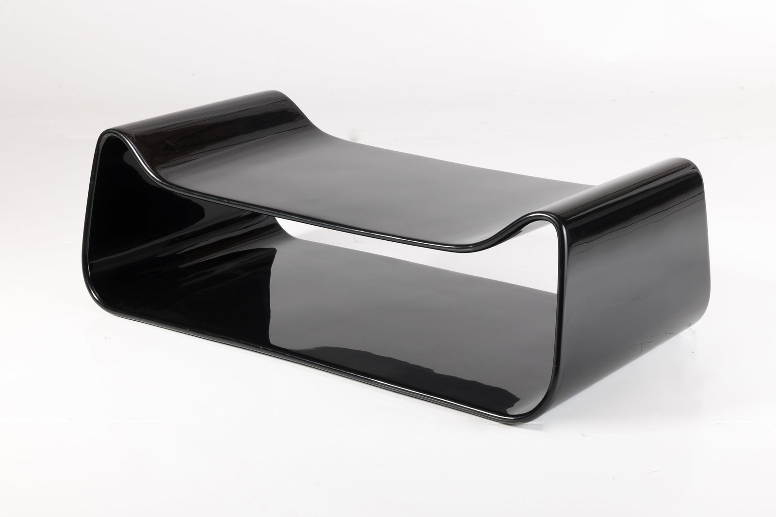 William Emmerson, 'Slope' Coffee Table: WILLIAM EMMERSON 'Slope' coffee table, 2000s Lacquered resin. Produced for Ralph Pucci, USA. 18" H x 51" W x 28.25" D