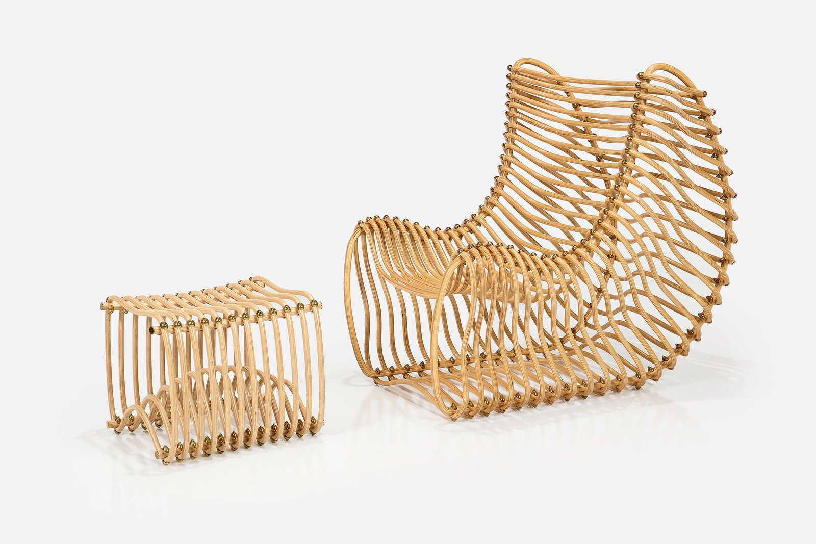 William Emmerson, 'Rib Line' Lounge Chair + Ottoman (2): WILLIAM EMMERSON 'Rib Line' lounge chair and ottoman, 21st century ApplePly, bronze. Hand-crafted in the USA. Chair: 46.5" H x 33.5" W x 49" D Seat height: