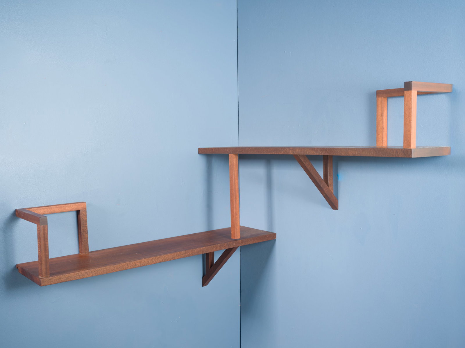 Taidgh O'Niell, Corner Bookshelf: TAIDGH O'NIELL Custom corner shelf, ca. 2021 Mahogany. Studio-made, Los Angeles, CA. 41.5" H x 49.5" W x 48.5" D