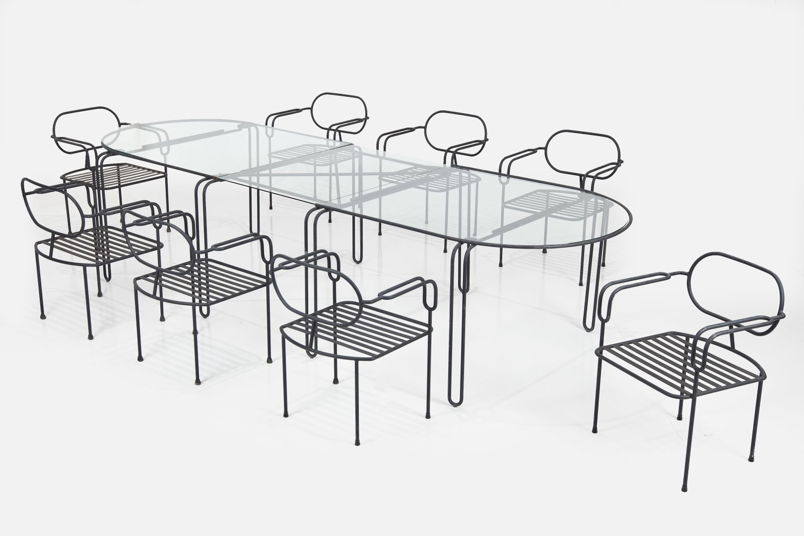 Shiro Kuramata Style, Dining Set (9): SHIRO KURAMATA STYLE Dining set, 2000s Patinated steel, glass. Custom-made, USA. Table: 30" H x 102" W x 48" D Each chair: 31” H x 24.5” W x 21” Seat height: