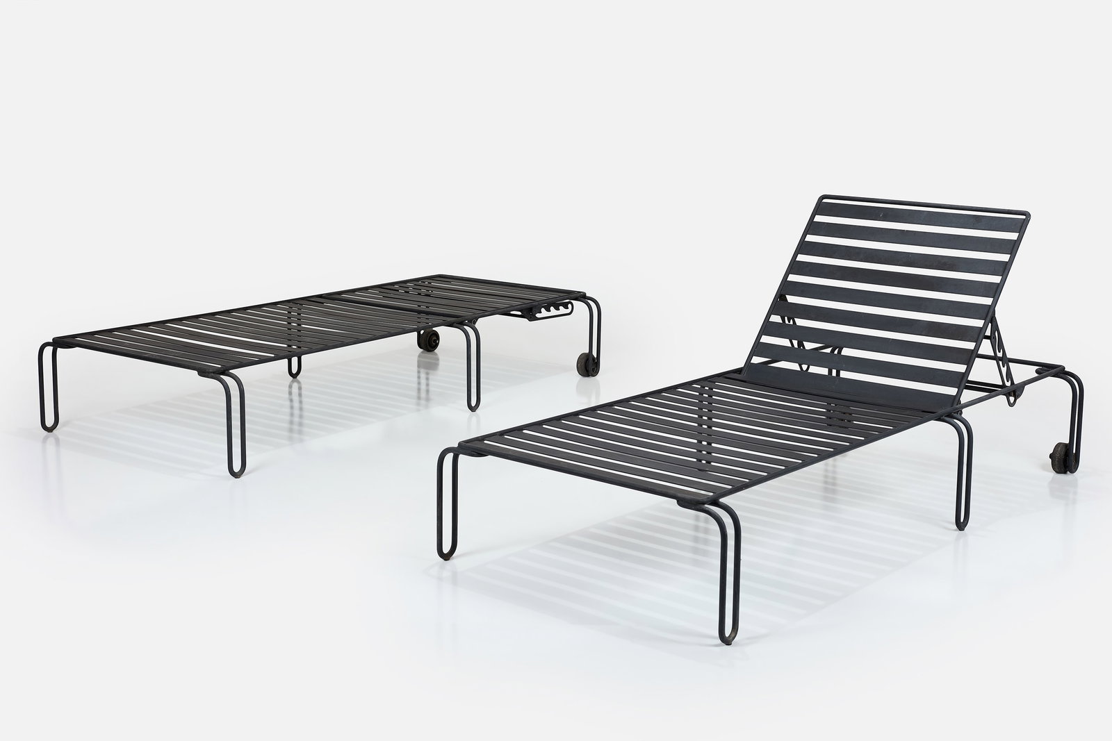 Shiro Kuramata Style, Chaise Lounges (2): SHIRO KURAMATA STYLE Pair of chaise lounges, 2000s Patinated steel. Custom-made, USA. Each: 35" H x 37.5" W x 83" D