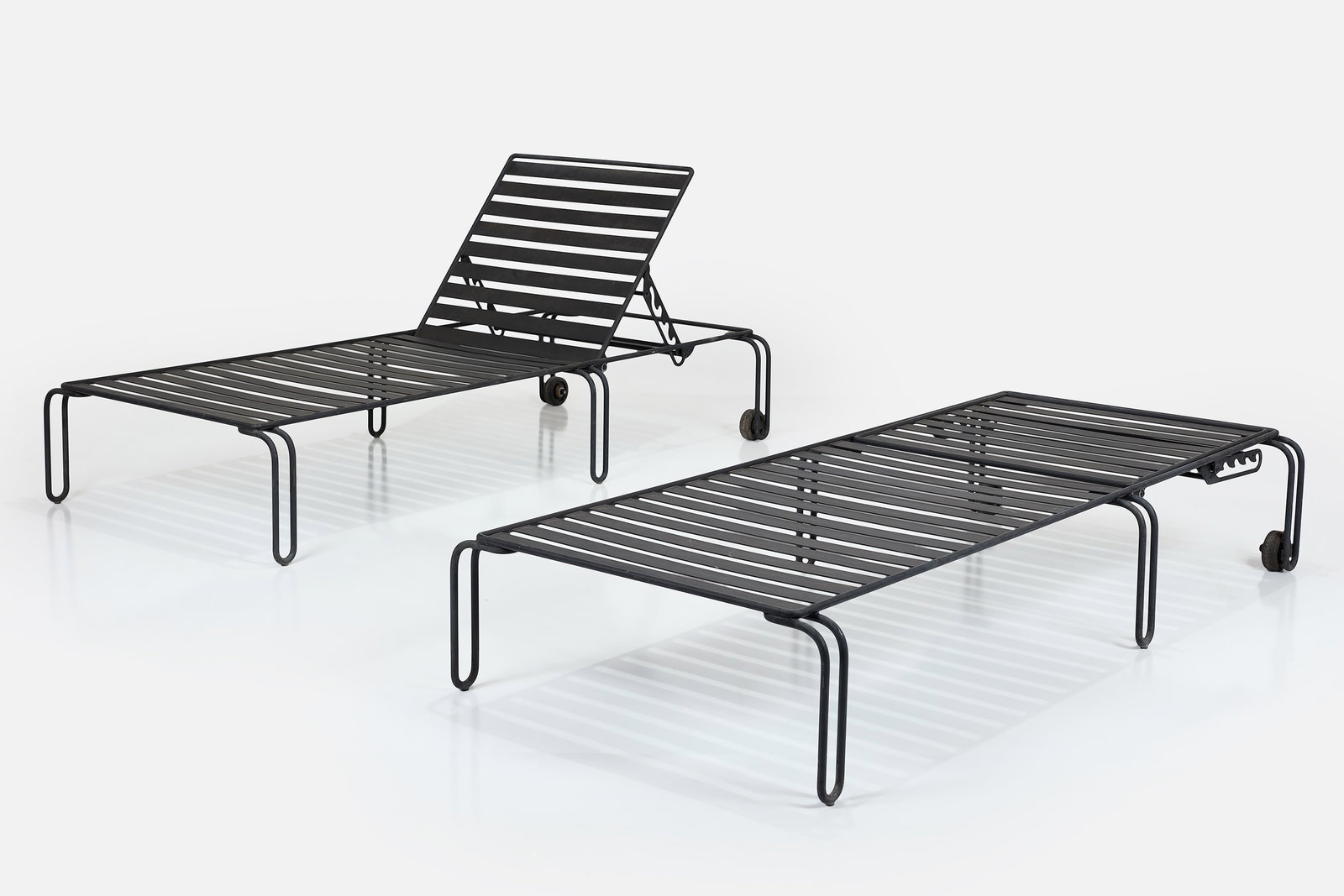 Shiro Kuramata Style, Chaise Lounges (2): SHIRO KURAMATA STYLE Pair of chaise lounges, 2000s Patinated steel. Custom-made, USA. Each: 35" H x 37.5" W x 83" D
