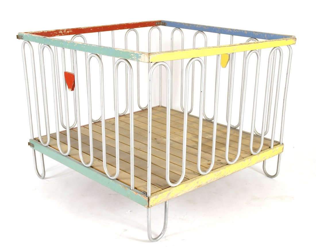 Gilbert Rohde playpen: Designed by Gilbert Rohde for Trimble Furniture. Part of the Century of Progress exhibition at the 1933 Chicago World’s Fair. Wood with aluminum. 41" W x 41" W x 33" T.