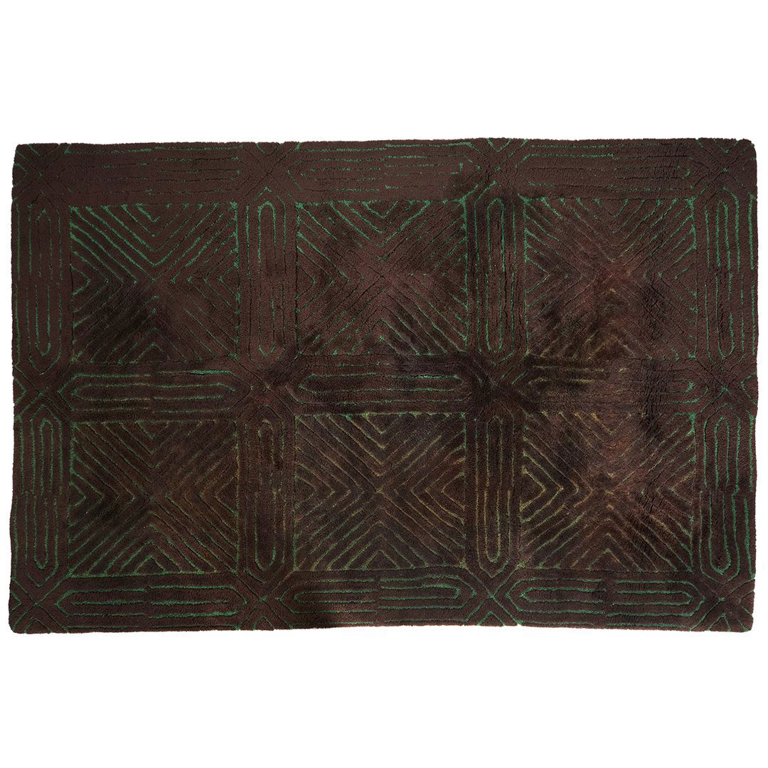 Edward Field's geometric rug: Geometric wool rug in brown and green by Edward Field's. circa 1960. 100"W, 84"D.