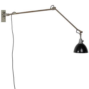 Curt Fischer mounted industrial lamp: Articulated wall mounted industrial lamp designed by Curt Fischer for Midgard, Germany, circa 1920. 48" L.