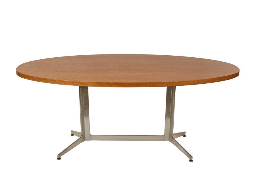 Ward Bennett table: Oak topped oval dining table or desk on aluminum base by Ward Bennett for Lehigh Furniture Company, 1950s. 28" H x 72" W x 42' D.