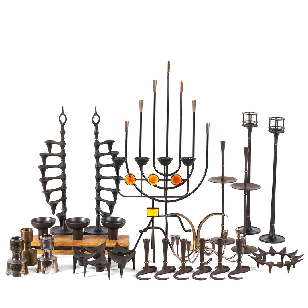 Collection of Scandinavian candle holders (27): Collection of twenty-seven iron and brass Scandinavian candle holders, 1950s - 1960s.