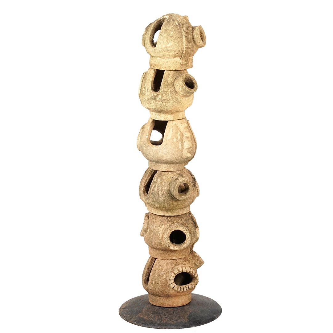 Abstract stoneware totem: Abstract bisque stoneware totem comprised of six stacking forms, 1960s totem. 48" T.