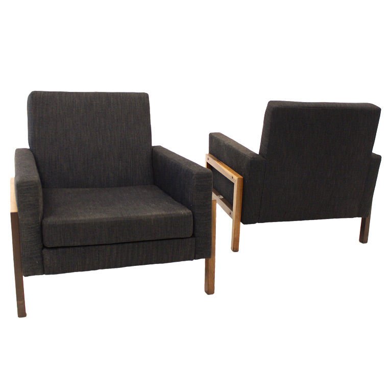 Lounge chairs with exotic wood base: Pair of charcoal lounge chairs with baruna wood bases and round wood accents, Brazil 1960s.