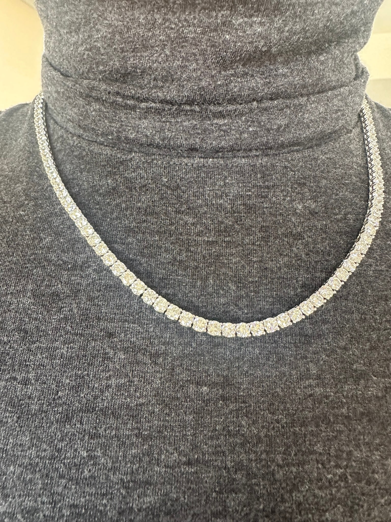 Men's 30 Carat Round tennis Necklace in 14k White Gold: 14k White Gold Mens Diamond tennis Necklace/Length of the Bracelet: 20 Inches/Total Diamond Weight: 30 Carat in a 20 inch Necklace/Solid 14K White Gold and Conflict free Lab grown Diamonds/Diamond Qua