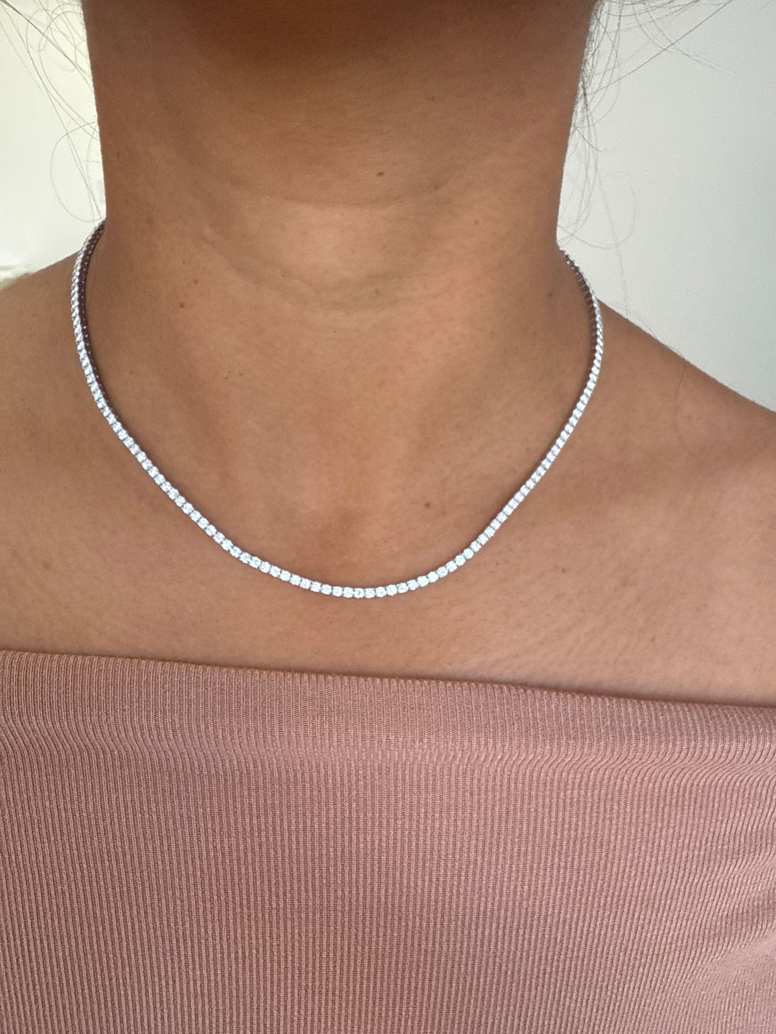 5 Carat Round Diamond tennis necklace in 14k White Gold: 14k White Gold Round Diamond Tennis Necklace /Length of the Necklace : 18 IncesTotal Diamond Weight : 5 Carat in a 18 Inch NecklaceSolid 14k White Gold & Conflict - Free Lab Grown Diamond/Diamond Qual