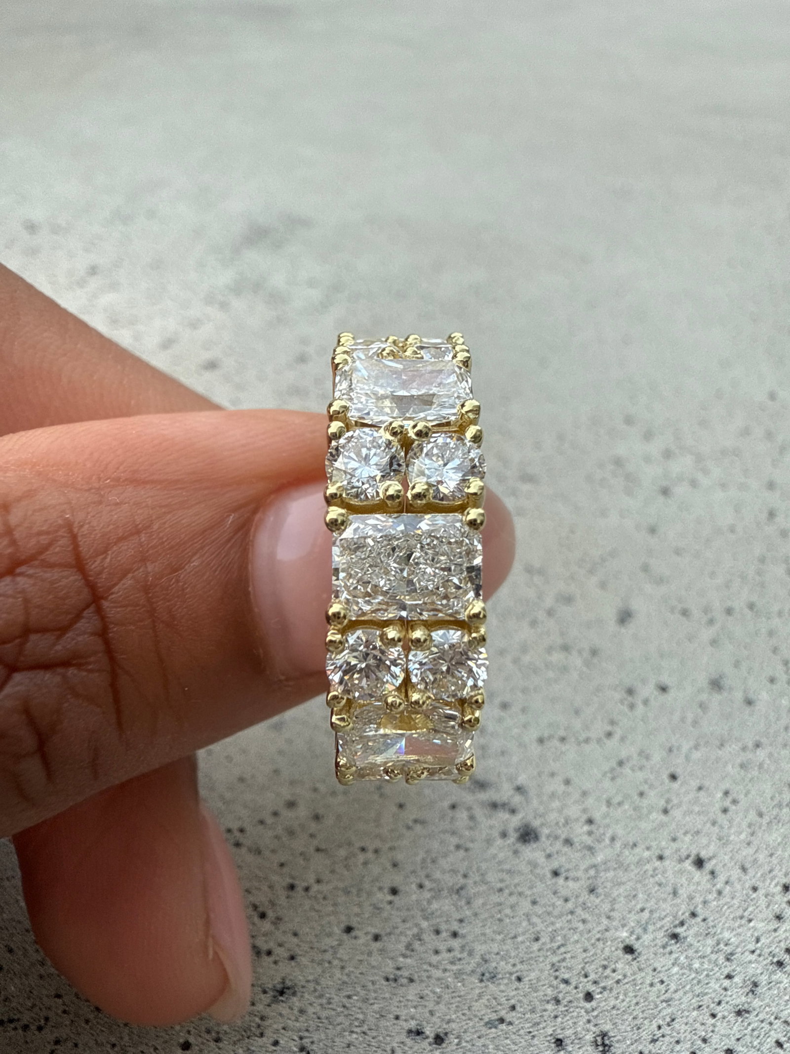 9 Carat Round & Radiant Diamond Eternity Band in 14k Yellow Gold: 14k Yellow Gold Round & Radiant Diamond Eternity Band /Total Diamond Weight: 9 Carat Solid 14k Yellow Gold & Conflict - Free Lab Grown Diamond/Diamond Quality : E in Color & VVS-VS in Clarity/Width :