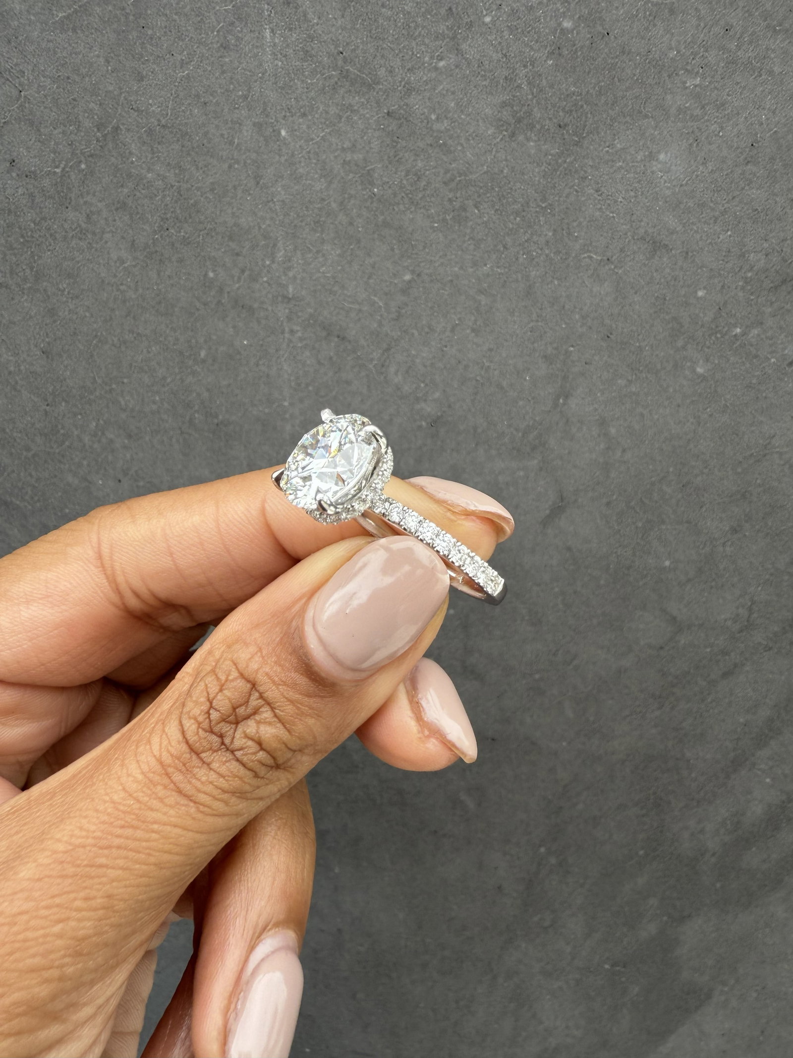 4 Carat Round ,hidden halo, pave diamond Engagement Ring in 14k White Gold: 14k White Gold Round hidden halo 1/2 pave Diamond Engagemant Ring /Total Diamond Weight: 4 Carat / Center Stone : 4 Carat / Side Stone: 0.40 CaratSolid 14k White Gold & Conflict - Free Lab Grown Diamo