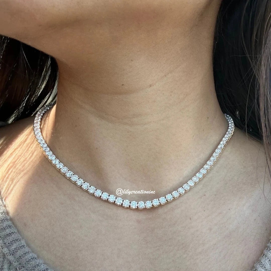 20 Carat Round Diamond Tennis Necklace in 14k Rose Gold: 14k Rose Gold Round Diamond Tennis Necklace /Length of the Necklace : 18 InchesTotal Diamond Weight : 20 Carat in a 18 Inch Necklace/Solid 14k Rose Gold & Conflict - Free Lab Grown Diamond/Diamond Qua