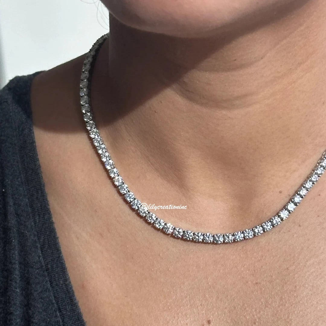 Women's 25 Carat Round Diamond Tennis Necklace in 14k White Gold: 14k White Gold Women's Round Diamond Tennis Necklace /Length of the Necklace : 18 InchesTotal Diamond Weight : 25 Carat in a 18 Inch Necklace/Solid 14k White Gold & Conflict - Free Lab Grown Diamond/D