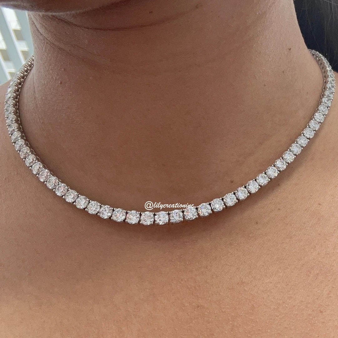 40 Carat Round Diamond Tennis Necklace in 14k White Gold: 14k White Gold Round Diamond Tennis Necklace /Length of the Necklace : 18 InchesTotal Diamond Weight : 40 Carat in a 18 Inch Necklace/Solid 14k White Gold & Conflict - Free Lab Grown Diamond/Diamond Q