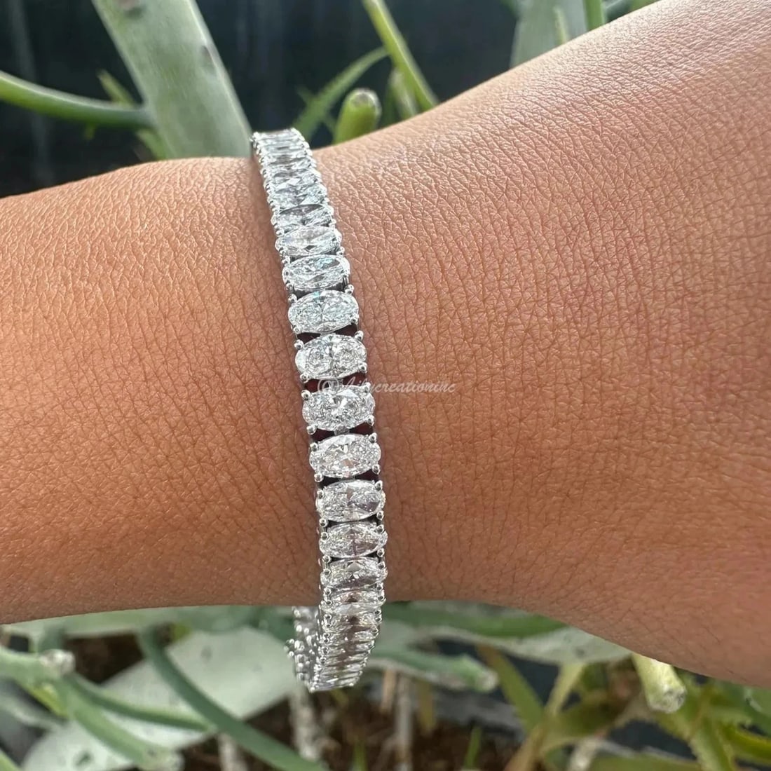15 Carat Oval Tennis Bracelet in 14k White Gold: 14k White Gold Oval Diamond Tennis Bracelet/Length of the Bracelet: 7 Inches/Total Diamond Weight: 15 Carat in a 7 inch Bracelet/Solid 14K White Gold and Conflict free Lab grown Diamonds/Diamond Quali