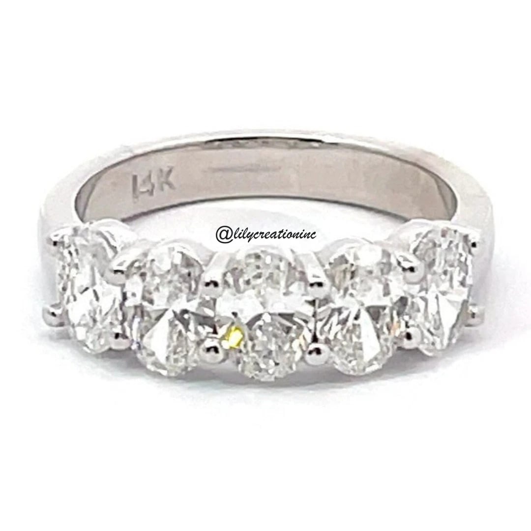 1.5 Carat 5 Stone Oval Diamond Eternity Band in 14k White Gold: 14k White Gold 5 Stone Oval Diamond Eternity Band /Total Diamond Weight: 1.50 Carat Solid 14k White Gold & Conflict - Free Lab Grown Diamond/Diamond Quality : E in Color & VVS-VS in Clarity/Width : 5.