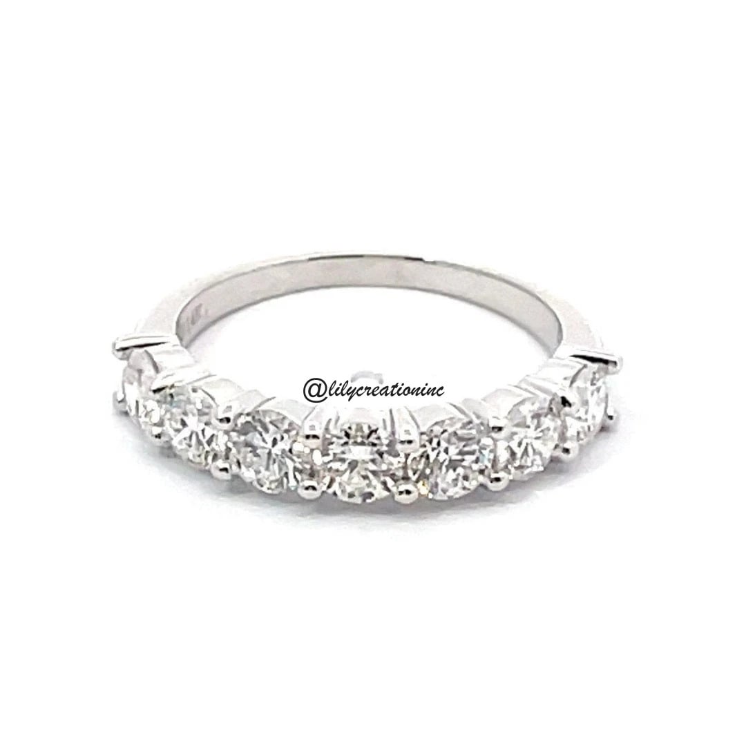 2 Carat 7 Stone Diamond Eternity Band in 14k White Gold: 14k White Gold 7 Stone Diamond Eternity Band /Total Diamond Weight: 2 Carat Solid 14k White Gold & Conflict - Free Lab Grown Diamond/Diamond Quality : E in Color & VVS-VS in Clarity/Width : 4.3 mmReta