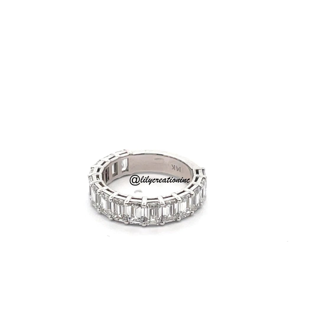 4 Carat Emerald Cut 3/4 Way Diamond Eternity Band in 14k White Gold: 14k White Gold Emerald 3/4 Way Diamond Eternity Band /Total Diamond Weight: 4 Carat Solid 14k White Gold & Conflict - Free Lab Grown Diamond/Diamond Quality : E in Color & VVS-VS in Clarity/Width : 4.