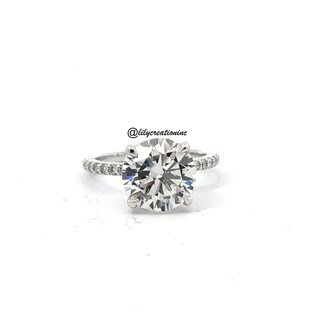 3 Carat Round Solitaire Diamond Engagement Ring w/ 3/4 Coverage Side Stones in 14k White Gold: 14k White Gold Round Soliatire w/ 3/4 Coverage Side Stones Diamond Engagement Ring /Total Diamond Weight: 3 Carat / Center Stone : 2 Carat / Side Stone : 0.40 Carat Solid 14k White Gold & Conflict - F