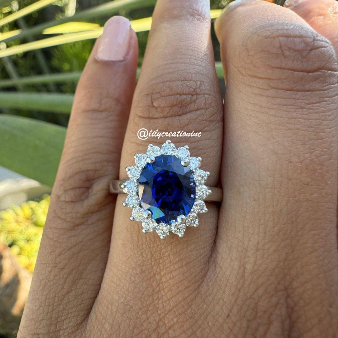 7 Carat Oval Sapphire Diamond Engagement Ring in 14k White Gold: 14k White Gold Oval Sapphaire Diamond Engagement Ring /Total Diamond Weight: 7 Carat / Center Stone : Carat / Side Stone : Carat Solid 14k White Gold & Conflict - Free Lab Grown Diamond/Diamond Qualit
