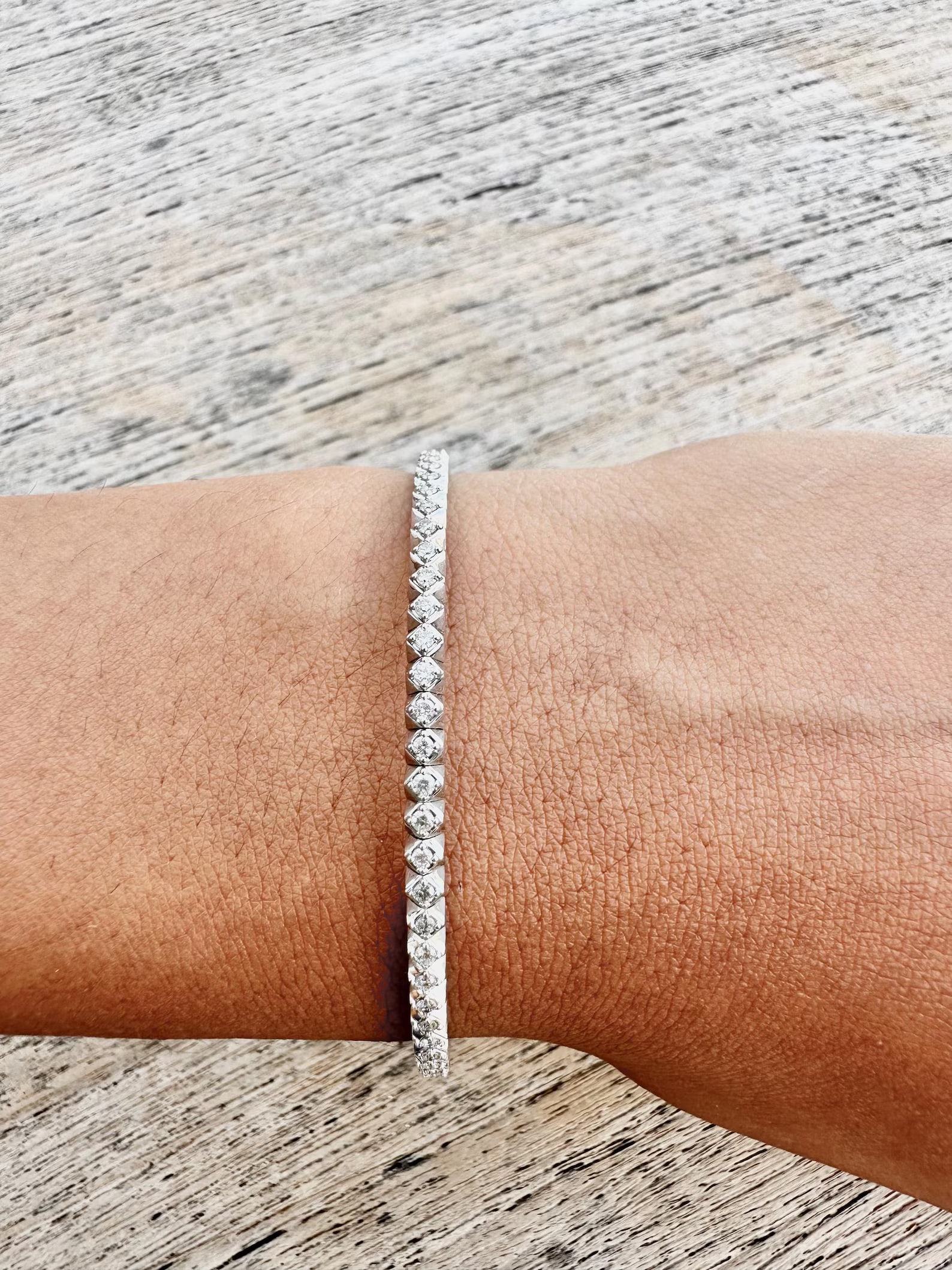 1 Carat Round Diamond Flexible Bangle in 14k White Gold: 14k White Gold Round Diamond Flexible Bangle/Length of the Bracelet: 7 Inches/Total Diamond Weight: 1 Carat in a 7 inch Bangle/Solid 14K White Gold and Conflict free Lab grown Diamonds/Diamond Quality