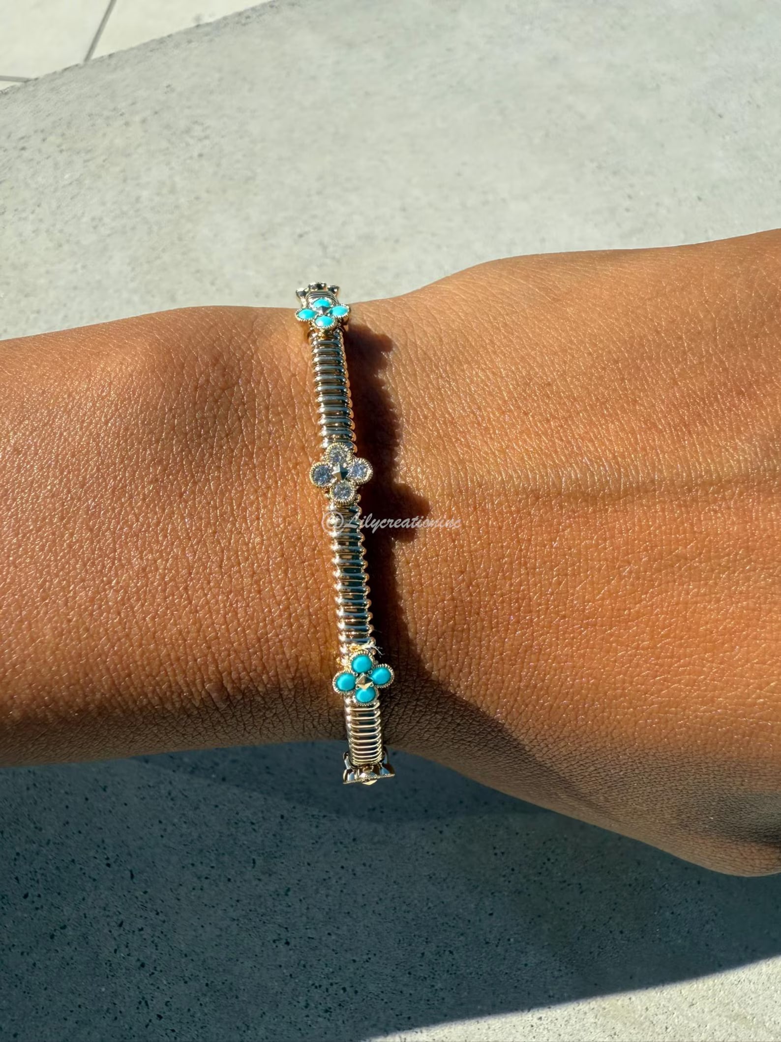 1 Carat Round Flower Diamond Flexible Bangle in 14k Yellow Gold: 14k Yellow Gold Round Flower DiamondFlexible Bangle/Length of the Bracelet: 7 Inches/Total Diamond Weight: 1 Carat in a 7 inch Bangle/Solid 14K Yellow Gold and Conflict free Lab grown Diamonds/Diamond