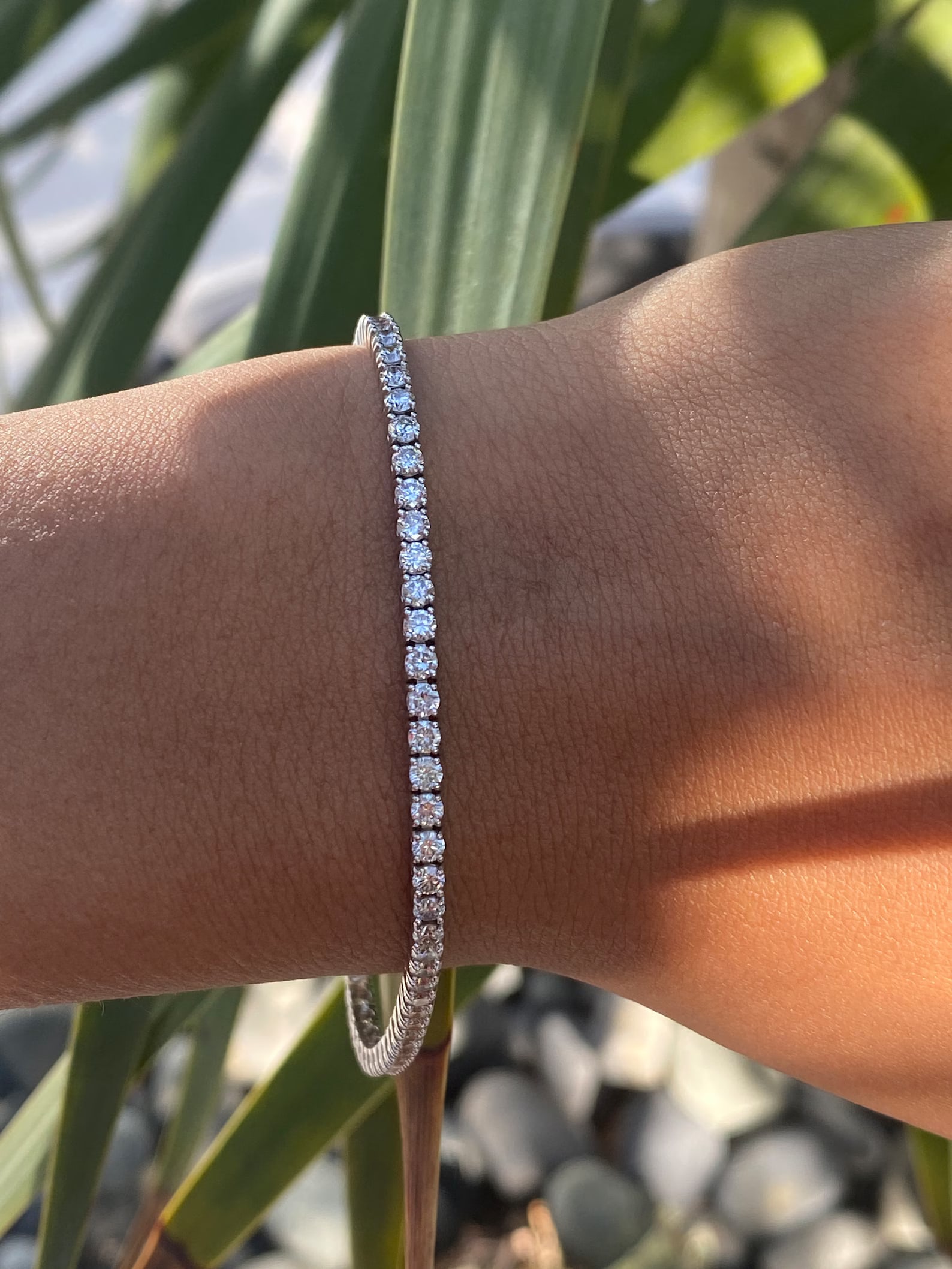 4.5 Carat Round Diamond Tennis Bracelet in 14k White Gold: 14k White Gold Round Diamond Tennis Bracelet/Length of the Bracelet: 7 Inches/Total Diamond Weight: 4.5 Carat in a 7 inch Bracelet/Solid 14K White Gold and Conflict free Lab grown Diamonds/Diamond Qua