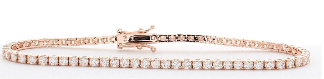 3 Carat Round Diamond Tennis Bracelet in 14k Rose Gold: 14k Rose Gold Round Diamond Tennis Bracelet/Length of the Bracelet: 7 Inches/Total Diamond Weight: 3 Carat in a 7 inch Bracelet/Solid 14K Rose Gold and Conflict free Lab grown Diamonds/Diamond Quality