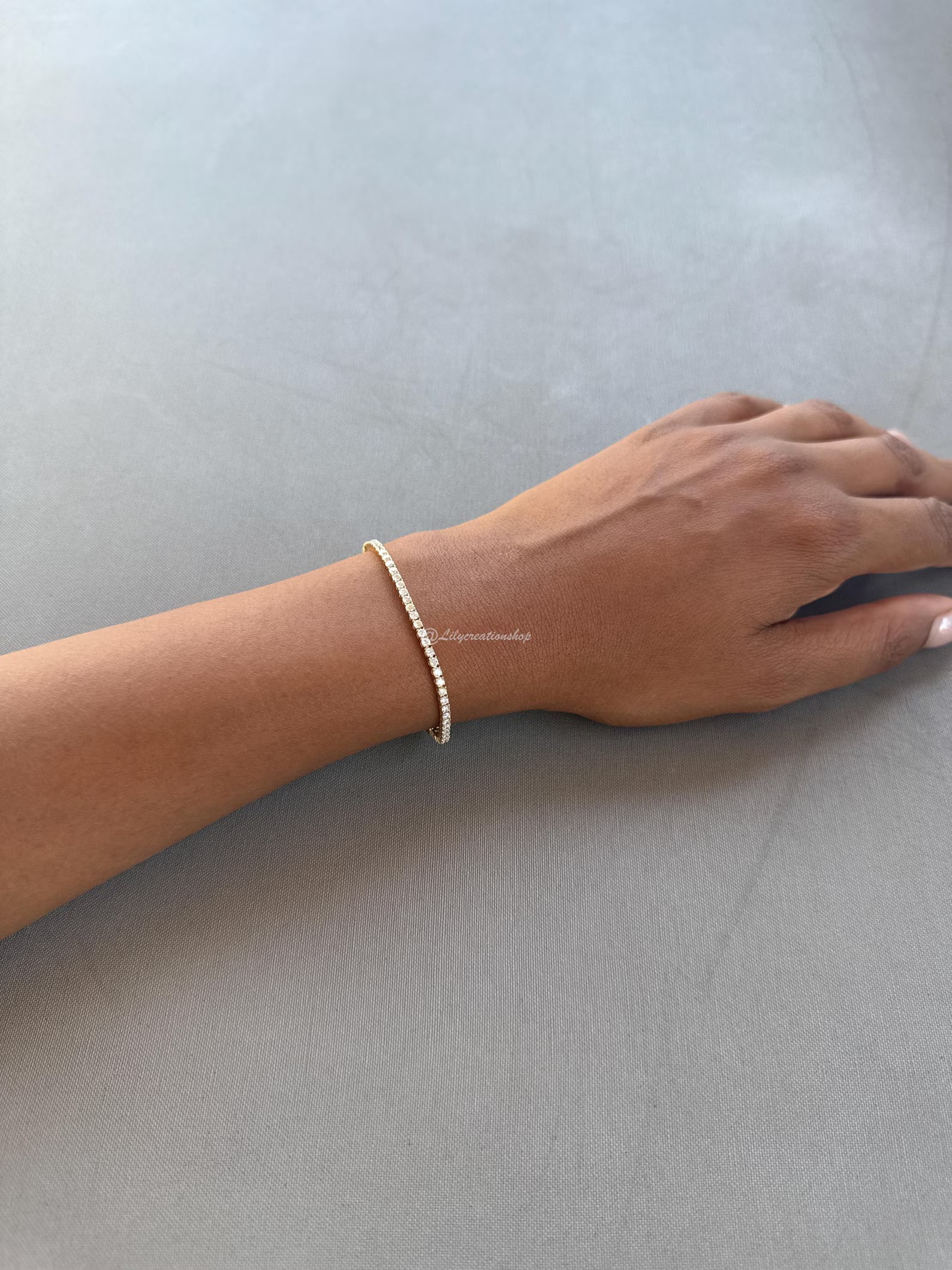 2.50 Carat Round Diamond Tennis Bracelet in 14k Yellow Gold: 14k White Gold Round Diamond Tennis Bracelet/Length of the Bracelet: 7 Inches/Total Diamond Weight: 2.50 Carat in a 7 inch Bracelet/Solid 14K White Gold and Conflict free Lab grown Diamonds/Diamond Qu