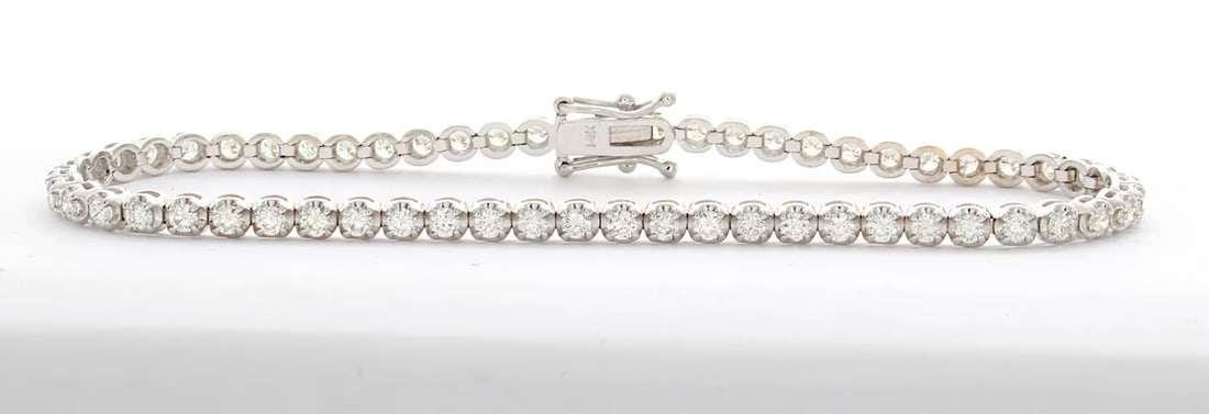 2 Carat Round Unique Diamond Tennis Bracelet in 14k White Gold: 14k White Gold Round Unique Diamond Tennis Bracelet/Length of the Bracelet: 7 Inches/Total Diamond Weight: 2 Carat in a 7 inch Bracelet/Solid 14K White Gold and Conflict free Lab grown Diamonds/Diamon