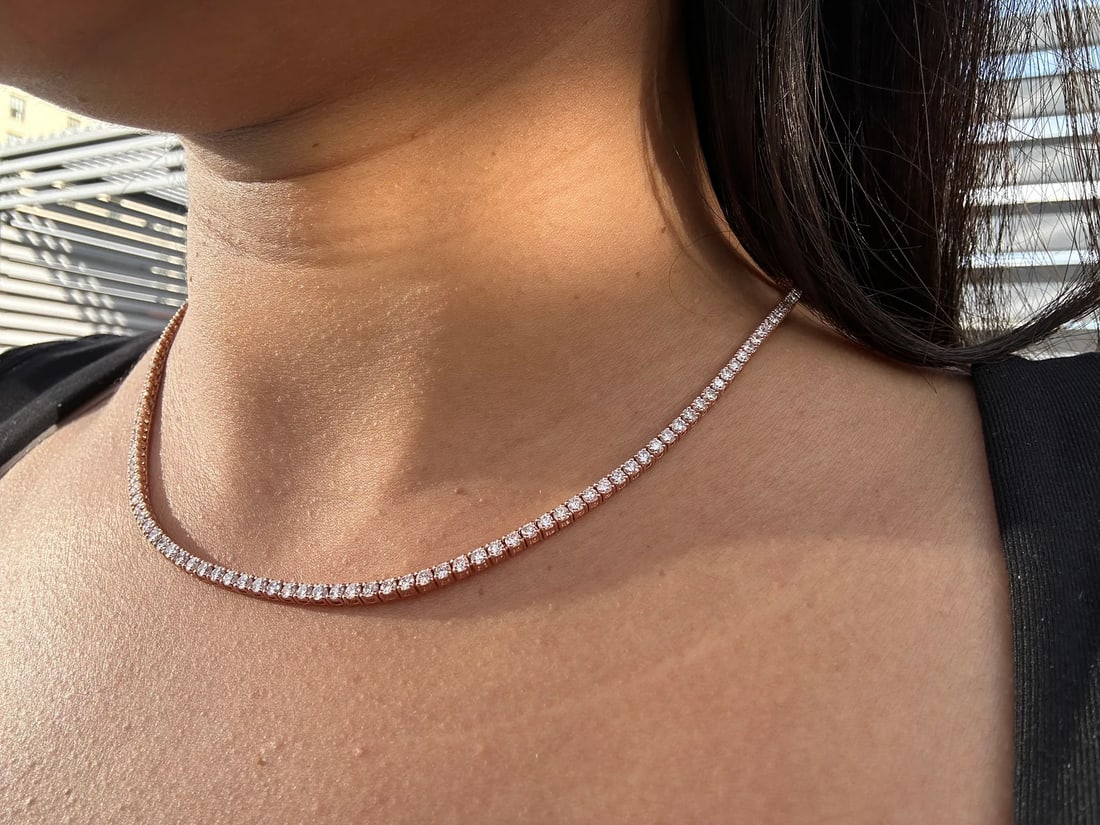 7 Carat Round Diamond Tennis Necklace in 14k Rose Gold: 14k Rose Gold Round Diamond Tennis Necklace /Length of the Necklace : 18 InchesTotal Diamond Weight : Carat in a 18 Inch Necklace/Solid 14k Rose Gold & Conflict - Free Lab Grown Diamond/Diamond Qualit