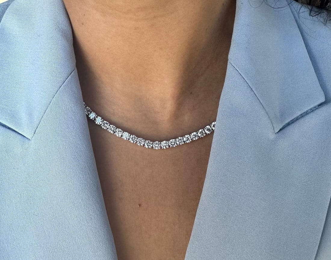 18 Carat Round Diamond Tennis Necklace in 14k White Gold: 14k White Gold Round Diamond Tennis Necklace /Length of the Necklace : 18 InchesTotal Diamond Weight : 18 Carat in a 18 Inch Necklace/Solid 14k White Gold & Conflict - Free Lab Grown Diamond/Diamond Q