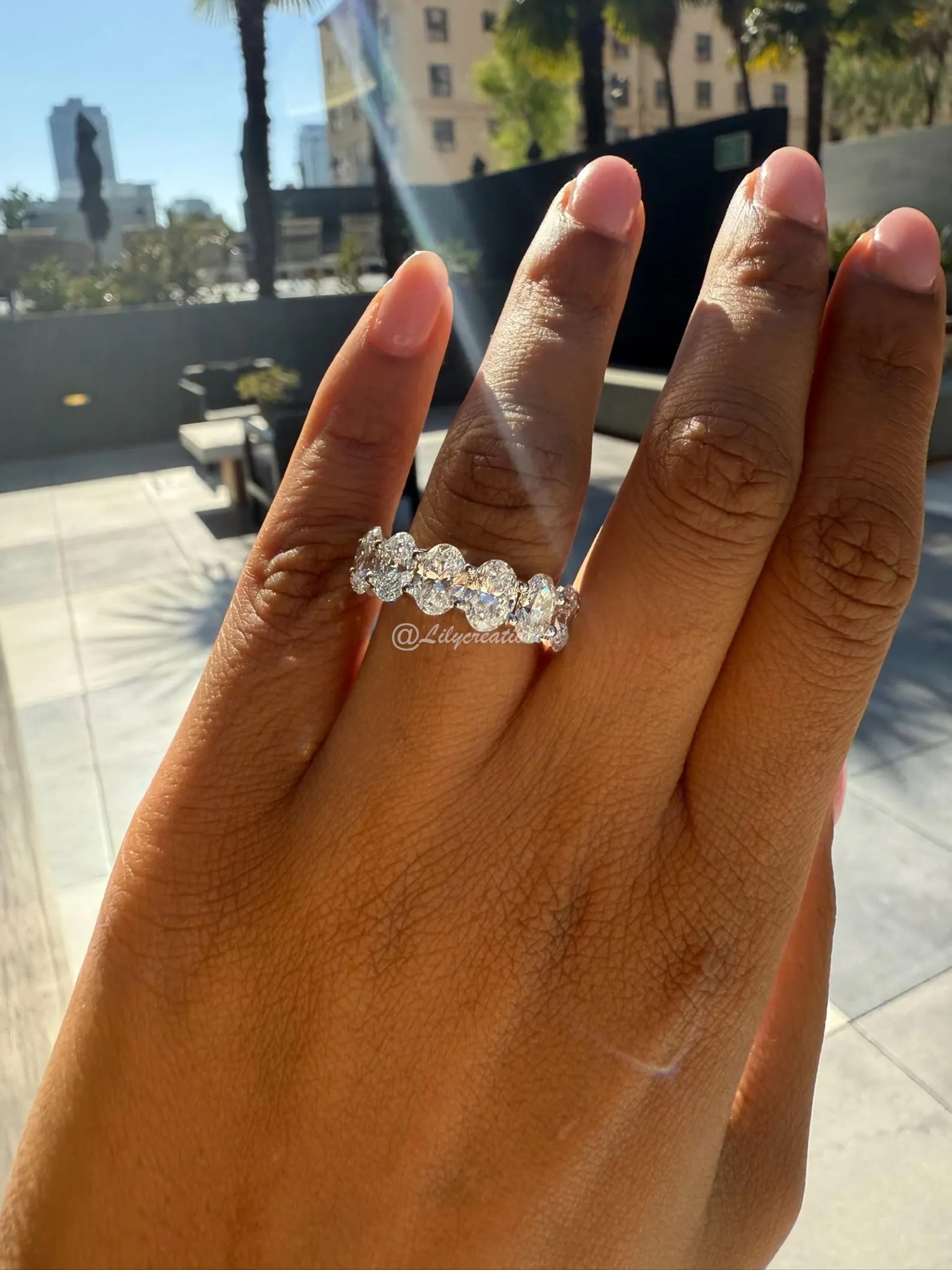 14 Carat Oval Diamond Eternity Band in 14k White Gold: 14k White Gold Oval Diamond Eternity Band /Total Diamond Weight: 14 Carat Solid 14k White Gold & Conflict - Free Lab Grown Diamond/Diamond Quality : E in Color & VVS-VS in Clarity/Width : 7.5 mmRetail