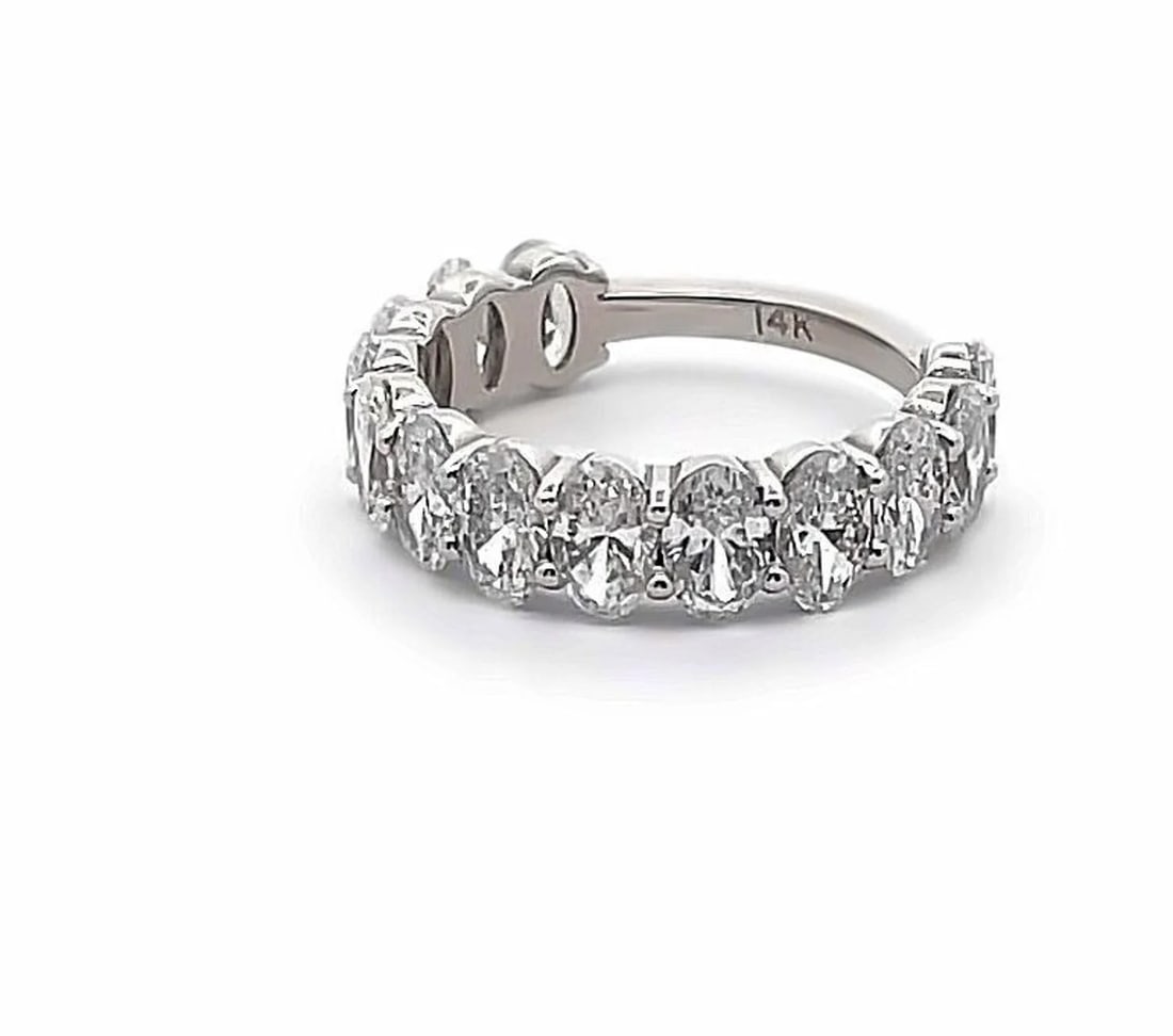 3.5 Carat Oval 3/4 Diamond Eternity Band in 14k White Gold: 14k White Gold Oval 3/4 Diamond Eternity Band /Total Diamond Weight: 3.5 Carat Solid 14k White Gold & Conflict - Free Lab Grown Diamond/Diamond Quality : E in Color & VVS-VS in Clarity/Width : 3.5 mmR
