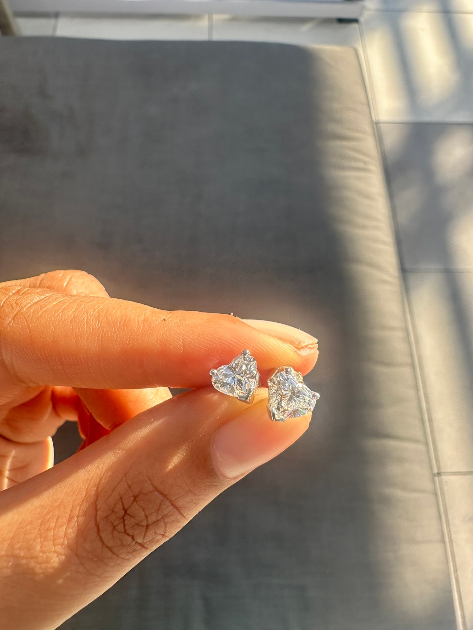 2 Carat Heart shaped Diamond Stud Earrings in 14k White Gold: 14k White Gold Diamond Stud Earrings/Total Diamond Weight: 2 CaratSolid 14K White Gold and Conflict free Lab grown Diamonds/Diamond Quality: E In Color & VVS-VS In Clarity/ Certification: IGIBacking: 