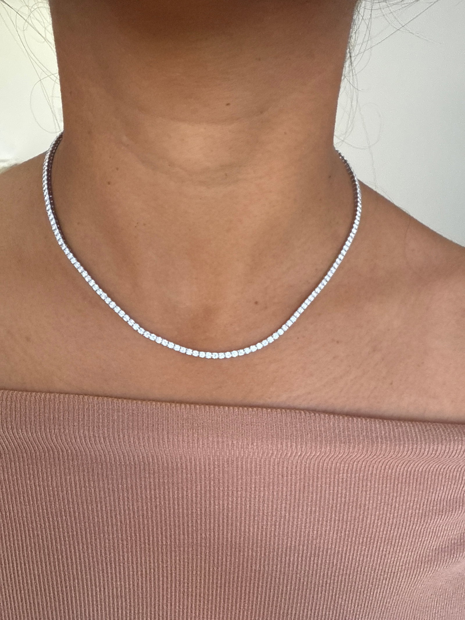 5 Carat Round Diamond tennis necklace in 14k White Gold: 14k White Gold Round Diamond Tennis Necklace /Length of the Necklace : 18 IncesTotal Diamond Weight : 5 Carat in a 18 Inch NecklaceSolid 14k White Gold & Conflict - Free Lab Grown Diamond/Diamond Qual
