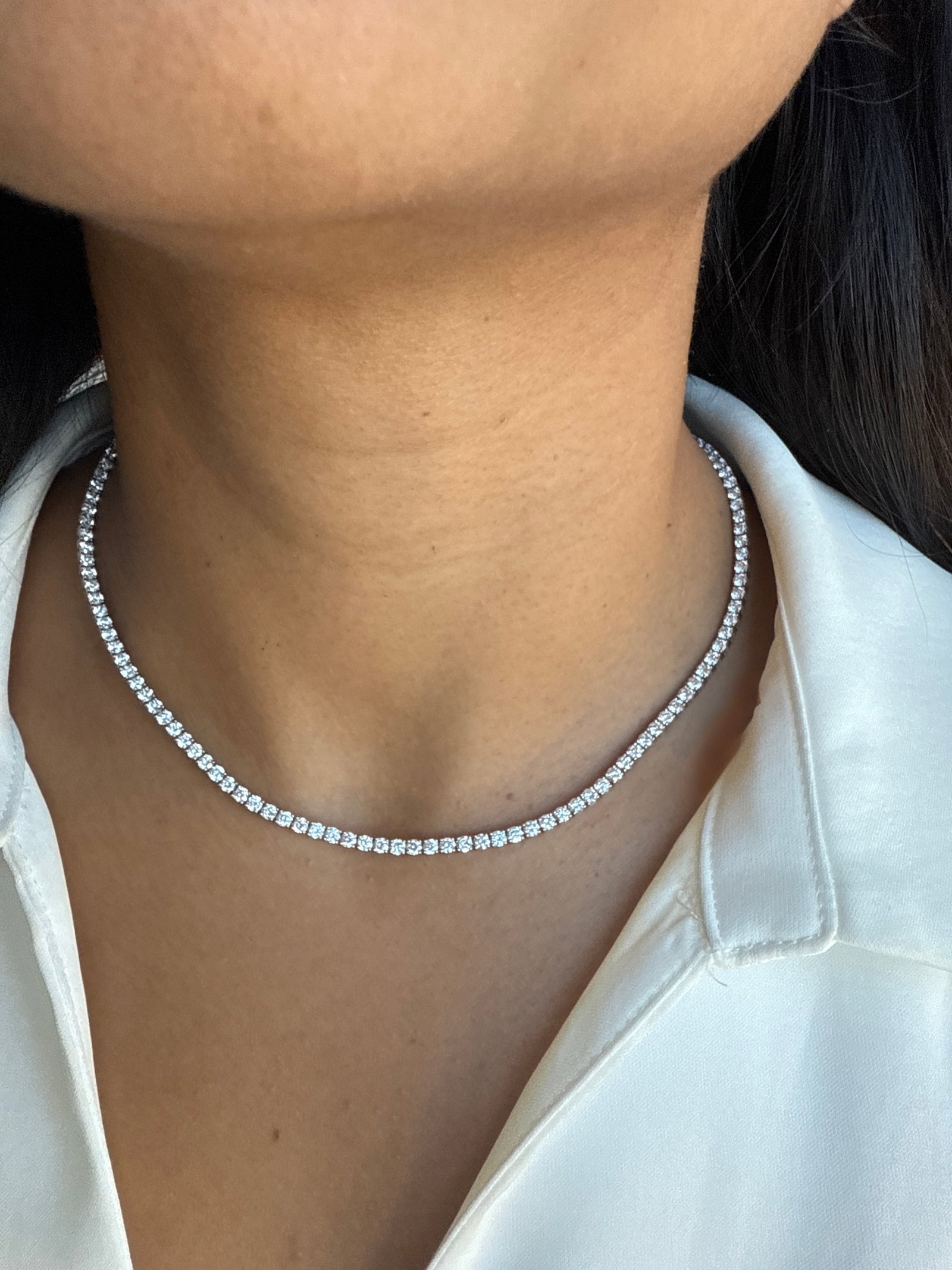 10 Carat Round Diamond tennis necklace in 14K White Gold: 14k White Gold Diamond Tennis Necklace /Length of the Necklace : 18 Inches Total Diamond Weight : 10 Carat in a 18 Inch Necklace/Solid 14k White Gold & Conflict - Free Lab Grown Diamond/Diamond Qualit