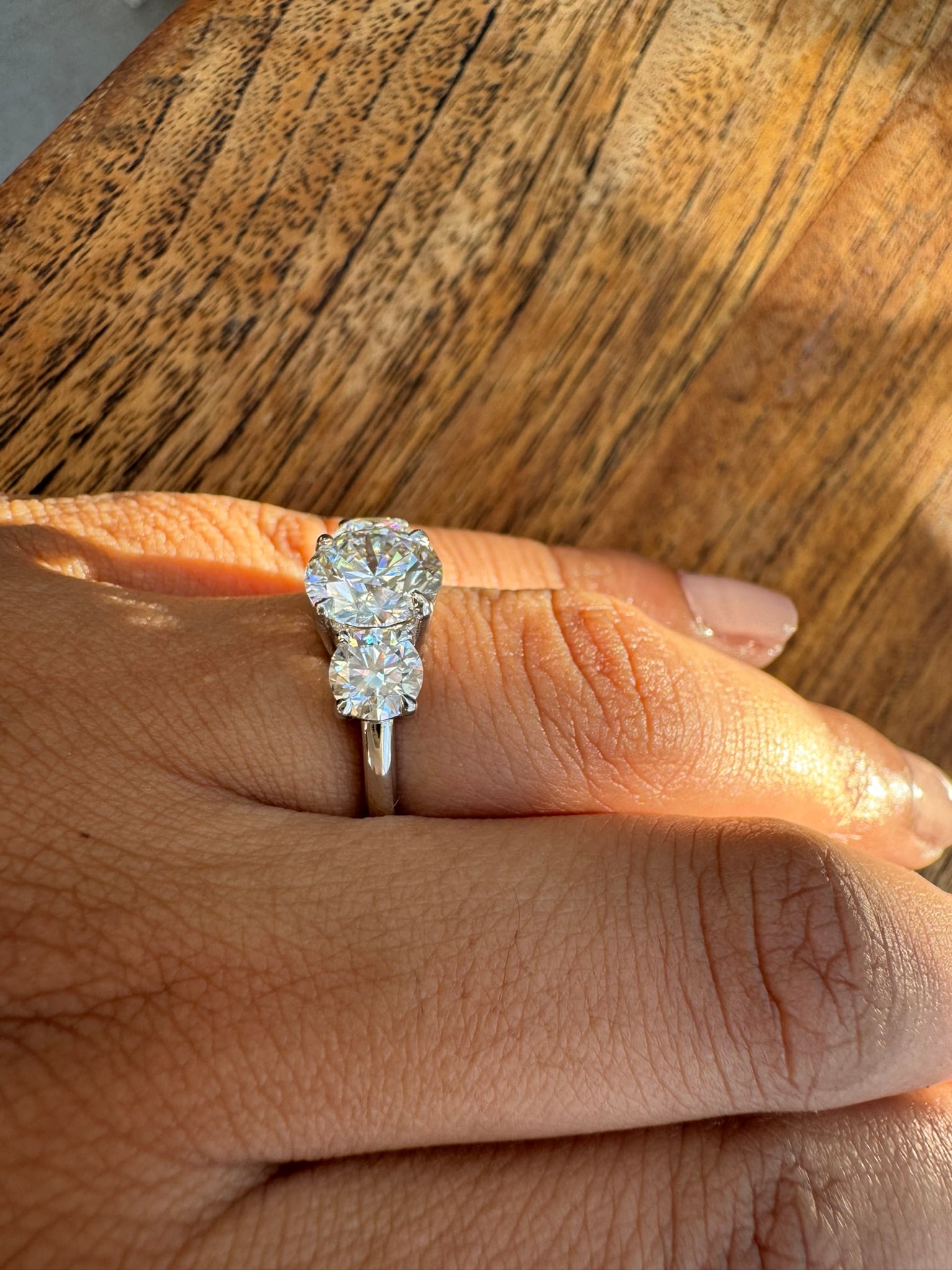 3 Carat 3 Stone Round Diamond Engagement Ring in 14k White Gold: 14k White Gold 3 Stone Round Diamond Engagemant Ring /Total Diamond Weight: 3 Carat / Side Stone : 1 CaratSolid 14k White Gold & Conflict - Free Lab Grown Diamond/Diamond Quality : E in Color & VVS-VS